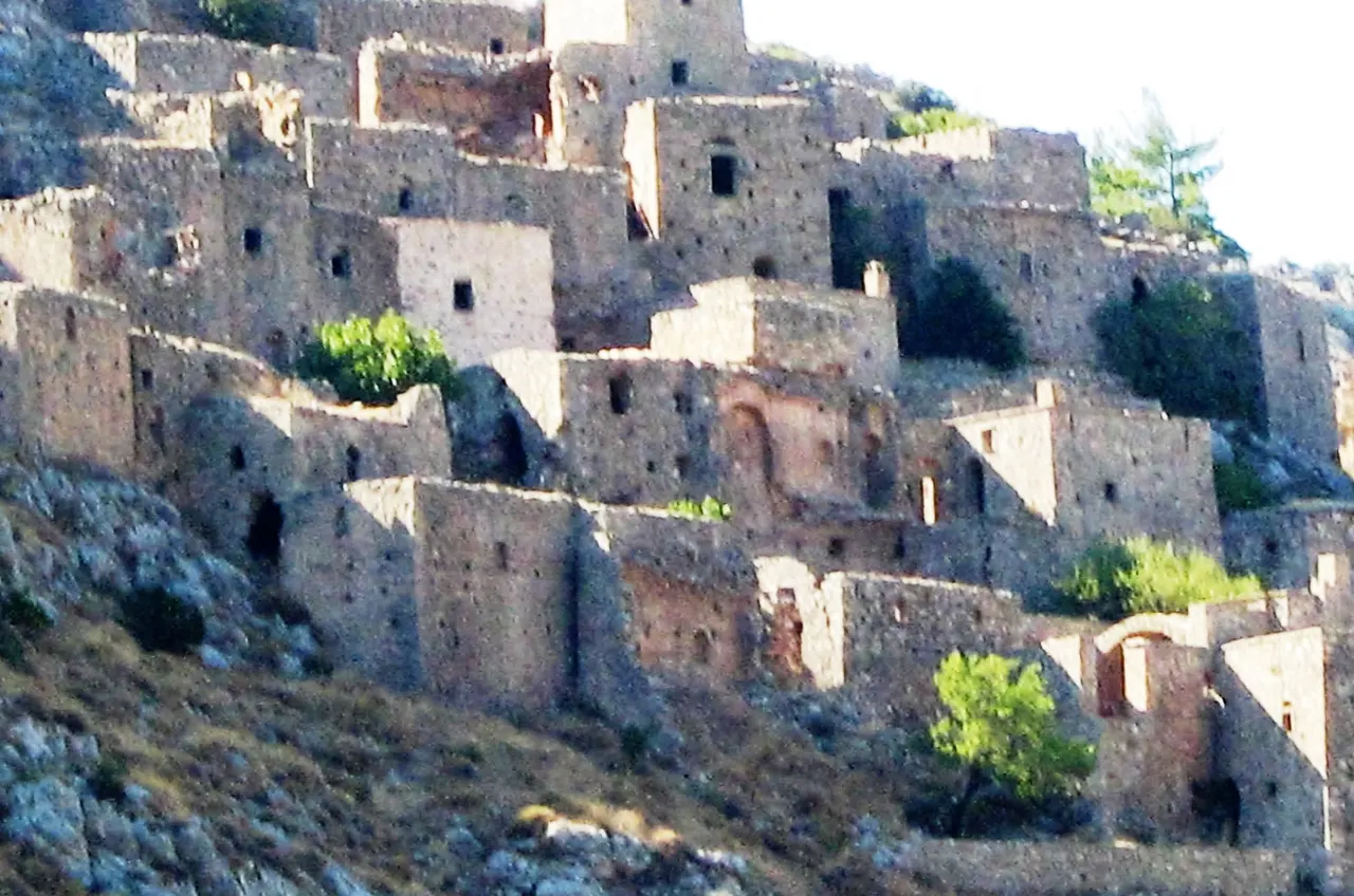 The abandoned stone houses of Anavatos stacked up a cliff on Chios