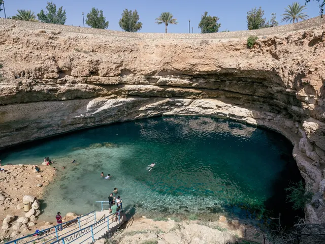 Turquoise water of the Bimmah Sinkhole seen from the rim